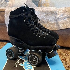 Sure Grip Black Suede Roller-skates